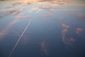 Plane Trails on an Upside Down Sunset Royalty Free Stock Photo