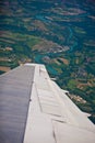 Plane turning over french country side and river Royalty Free Stock Photo