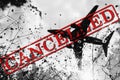 Image of plane with the word cancelled written in red, related with the corona virus