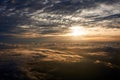 Plane view of a sun and clouds
