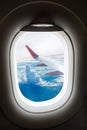 Plane window with cloud view aboard Royalty Free Stock Photo