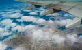 Plane wing over clouds Royalty Free Stock Photo