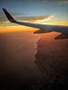 Plane wing sea view airborne Royalty Free Stock Photo
