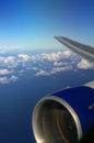 Plane Wing with sky and ocean background Royalty Free Stock Photo
