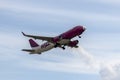 Plane Wizz Air in sky Royalty Free Stock Photo