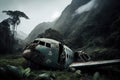 plane wreck in jungle, with view of the mist-covered mountain range in the distance Royalty Free Stock Photo