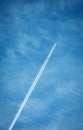 The plane writes lines across the sky Royalty Free Stock Photo
