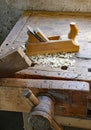 Planer shavings and sawdust in an antique wooden Workbench