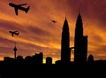 Planes departing Kuala Lumpur at sunset Royalty Free Stock Photo