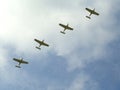 Planes fly in the sky one after another show aerobatics Royalty Free Stock Photo