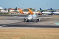 Planes on the runway of the airline Ryanair, easyJet and TAP Air Portugal