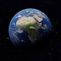 Planet Earth. Africa in center with city lights in dark areas Royalty Free Stock Photo