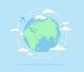 Planet Earth with an airplane flying around it and clouds on a blue background. Flat vector illustration Royalty Free Stock Photo