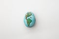 Planet Earth America painted on an egg on white background Royalty Free Stock Photo