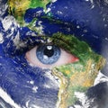 Planet earth and blue human eye Royalty Free Stock Photo