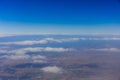 Planet earth. Blue sky, white clouds, land. View from above. Royalty Free Stock Photo