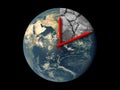 Planet Earth Ecology Death Countdown concept. Red hands clock on Earth running towards natural climate change disaster isolated Royalty Free Stock Photo