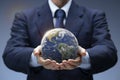 Planet Earth in hand of business man. Businessman hold Global World show Global warming, Save Environment, Earth day, Worldwide Royalty Free Stock Photo