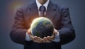 Planet Earth in hand of business man. Businessman hold Global World show Global warming, Save Environment, Earth day, Worldwide Royalty Free Stock Photo