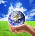 Planet Earth hand-held Royalty Free Stock Photo