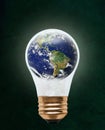 Planet Earth Inside Floating Light Bulb With Copy Space Royalty Free Stock Photo