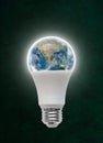 Planet Earth Inside LED Light Bulb With Copy Space Royalty Free Stock Photo