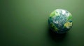 Planet Earth Isolated on Green Background, Perfect for Environment, Geography, or Astronomy Stories