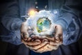 Planet Earth in our hands . Mixed media Royalty Free Stock Photo