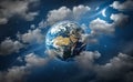 Planet Earth surrounded by clouds, the moon and stars in the night sky. Royalty Free Stock Photo