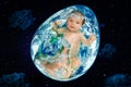 Planet in the form of egg with a baby inside in outer space Royalty Free Stock Photo