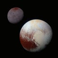 Planet Pluto and his moon Charon. Elements of this image were furnished by NASA Royalty Free Stock Photo