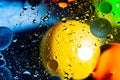 Mixing water and oil on a beautiful color abstract background gradient balls circles and ovals