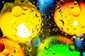 Mixing water and oil on a beautiful color abstract background gradient balls circles and ovals