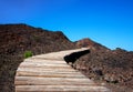 Plank way across volcanic black earth, near Punta de Teno, Island Tenerife, Canary Islands