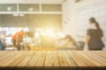 Plank wooden table top and blurred abstract background from interior building banner backdrop with desk blur, counter work people Royalty Free Stock Photo