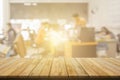 Plank wooden table top and blurred abstract background from interior building banner backdrop with desk blur, counter work people Royalty Free Stock Photo