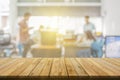 Plank wooden table top and blurred abstract background from interior building banner backdrop with desk blur, counter work people Royalty Free Stock Photo