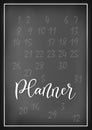 Planner in white on chalkboard background decorated with numerals and white frame