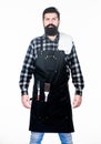 Planning a BBQ. Professional hipster cook. Brutal hipster wearing grilling apron. Bearded hipster ready for preparing