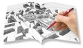 Planning a new city - Engineer-architect drawing with a pencil a sketch of a new modern imaginary town- Real opened book concept