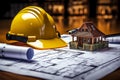 Planning prowess, blueprints with a yellow helmet and drawing tools Royalty Free Stock Photo