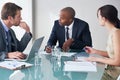 Planning, serious and crisis with business people in meeting for idea, documents and negotiation. Collaboration, data Royalty Free Stock Photo