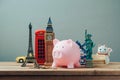 Planning summer vacation, budget trip concept with piggy bank. Royalty Free Stock Photo