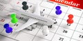 Airplane white and colorful push pins, on a calendar background. 3d illustration.