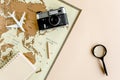 Planning vacation, travel plan, trip vacation using world map along with other travel accessories. Top view, flat lay. Royalty Free Stock Photo