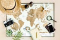 Planning vacation, travel plan, trip vacation using world map along with other travel accessories. Top view, flat lay. Royalty Free Stock Photo