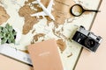 Planning vacation, travel plan, trip vacation using world map along with other travel accessories. Top view, flat lay. Royalty Free Stock Photo