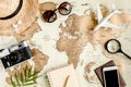 Planning vacation, travel plan, trip vacation using world map along with other travel accessories. Top view, flat lay. Royalty Free Stock Photo