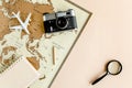 Planning vacation, travel plan, trip vacation using world map along with other travel accessories. Top view, flat lay. Royalty Free Stock Photo