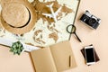 Planning vacation, travel plan, trip vacation using world map along with other travel accessories. Top view, flat lay. Royalty Free Stock Photo